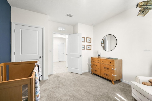 9098 Forge Breeze Loop, Wesley Chapel, FL 33545 - bedroom with arched walkways and light carpet