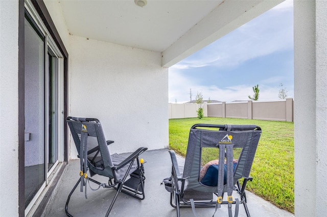 9098 Forge Breeze Loop, Wesley Chapel, FL 33545 - fenced backyard with a patio