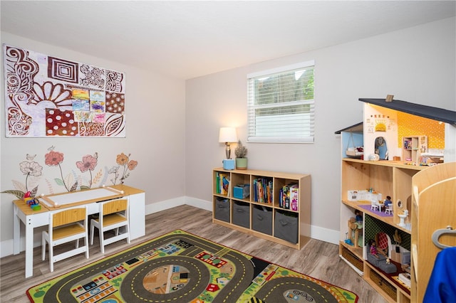 615 6th Ave N, Safety Harbor, FL 34695 - playroom featuring wood finished floors and baseboards