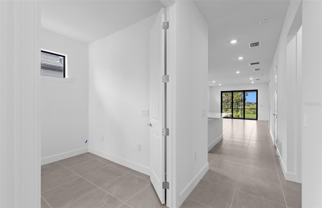 6133 Wire Grass Ct, Nokomis, FL 34275 - hall featuring tile patterned floors and recessed lighting
