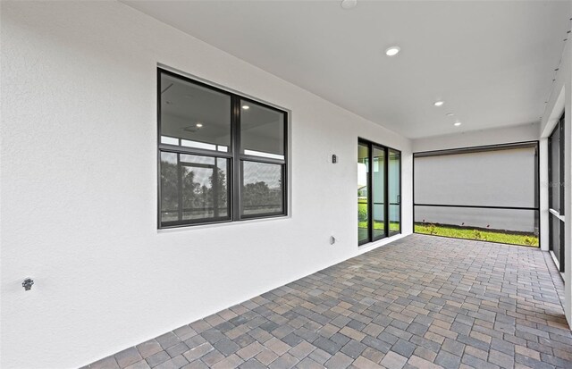 6133 Wire Grass Ct, Nokomis, FL 34275 - view of unfurnished sunroom