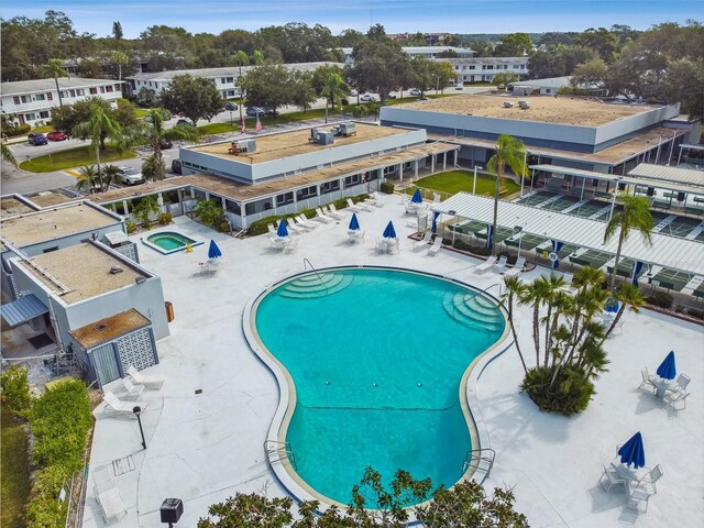 8080 112th St Unit 108, Seminole, FL 33772 - community pool with a patio area and a hot tub