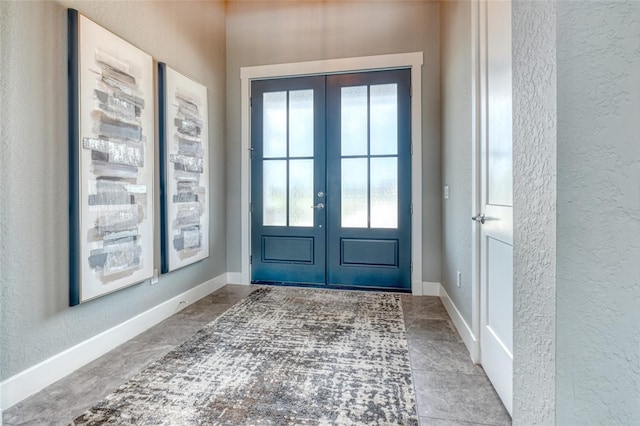 12902 SW 138th Loop, Dunnellon, FL 34432 - foyer entrance with a textured wall and french doors