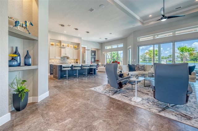 12902 SW 138th Loop, Dunnellon, FL 34432 - living area with a ceiling fan and baseboards