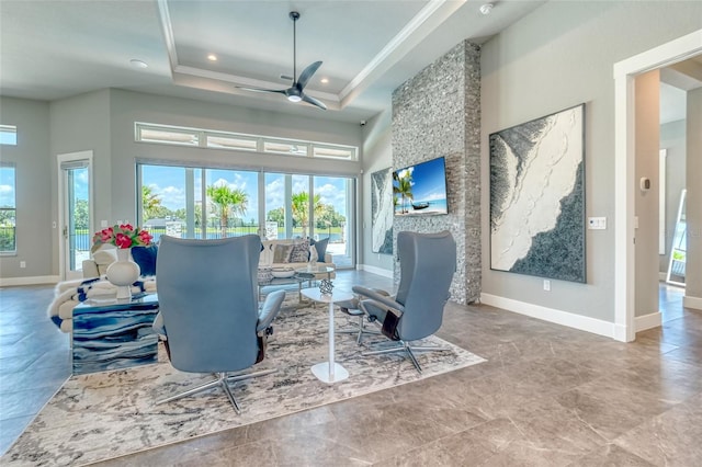 12902 SW 138th Loop, Dunnellon, FL 34432 - living room with healthy amount of natural light, a ceiling fan, a towering ceiling, recessed lighting, and a raised ceiling