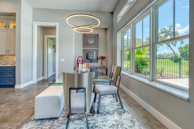 12902 SW 138th Loop, Dunnellon, FL 34432 - dining area with a chandelier and marble finish floors