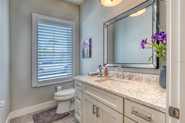 12902 SW 138th Loop, Dunnellon, FL 34432 - bathroom with vanity, tile patterned floors, and a textured wall