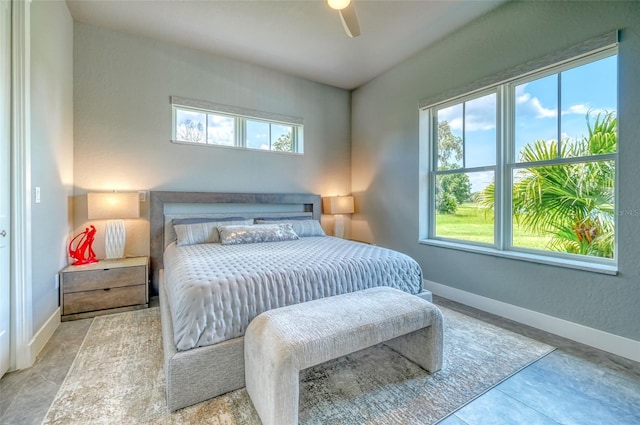 12902 SW 138th Loop, Dunnellon, FL 34432 - bedroom with baseboards and ceiling fan