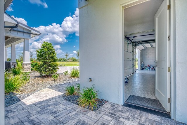 12902 SW 138th Loop, Dunnellon, FL 34432 - view of exterior entry with a patio