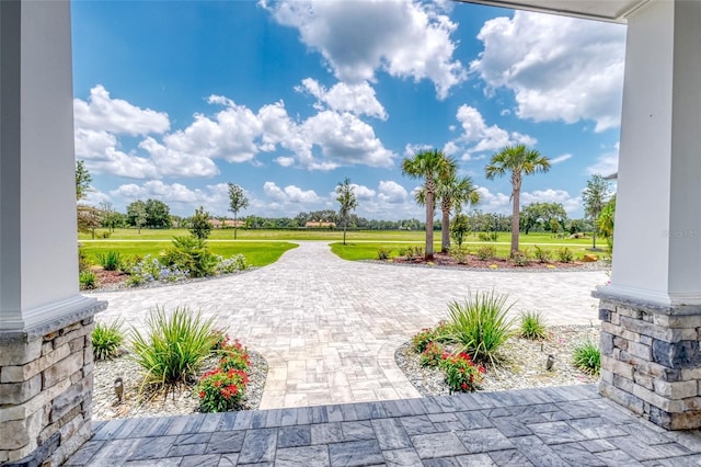 12902 SW 138th Loop, Dunnellon, FL 34432 - view of patio / terrace with curved driveway