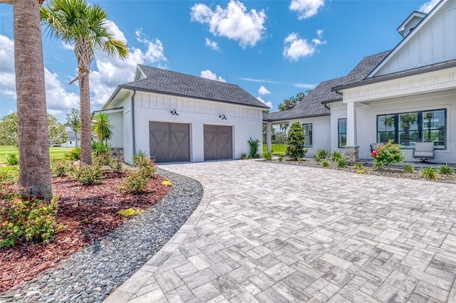 12902 SW 138th Loop, Dunnellon, FL 34432 - garage featuring decorative driveway