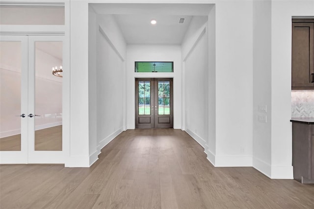 937 Old Welcome Rd, Lithia, FL 33547 - entryway with french doors, wood finished floors, and recessed lighting