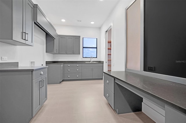 937 Old Welcome Rd, Lithia, FL 33547 - kitchen with gray cabinets, dark countertops, and recessed lighting