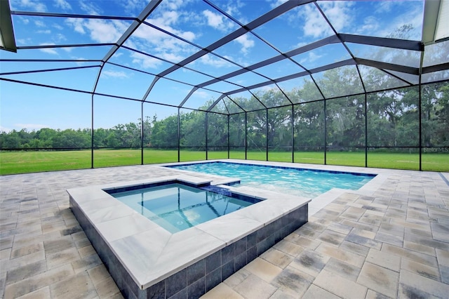 937 Old Welcome Rd, Lithia, FL 33547 - view of pool featuring a lawn, a patio, a lanai, and a pool with connected hot tub