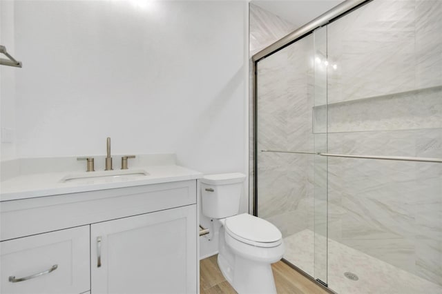 937 Old Welcome Rd, Lithia, FL 33547 - full bath featuring a stall shower, vanity, and wood finished floors