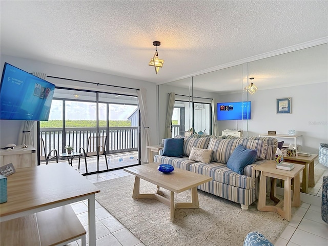 809 Bahia Del Sol Dr Unit 72, Ruskin, FL 33570 - living room featuring light tile patterned floors and a textured ceiling