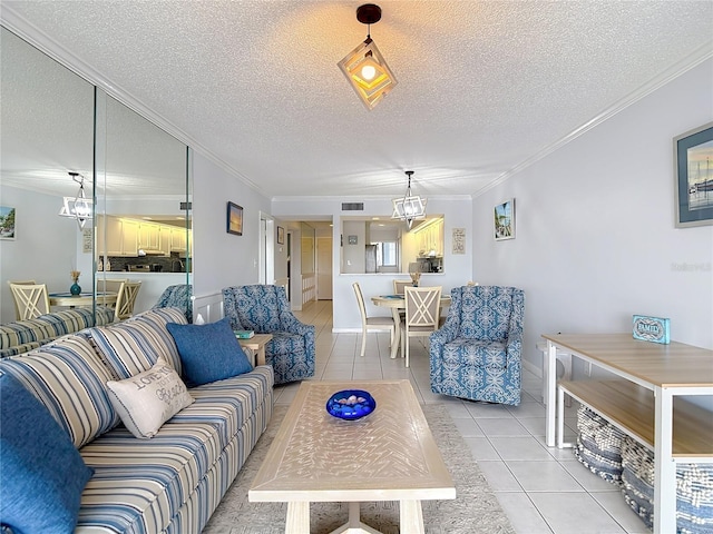 809 Bahia Del Sol Dr Unit 72, Ruskin, FL 33570 - living area with a chandelier, light tile patterned floors, ornamental molding, and a textured ceiling