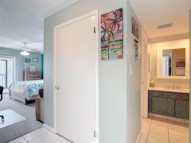 809 Bahia Del Sol Dr Unit 72, Ruskin, FL 33570 - hall with light tile patterned floors and a textured ceiling