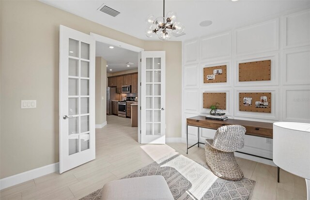 14317 Eagle Branch Dr, Nokomis, FL 34275 - home office featuring french doors, a chandelier, and recessed lighting