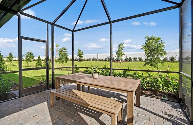 14317 Eagle Branch Dr, Nokomis, FL 34275 - sunroom with outdoor dining space