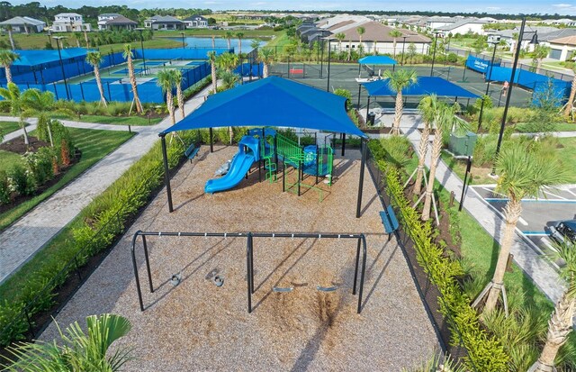 14317 Eagle Branch Dr, Nokomis, FL 34275 - community jungle gym with a residential view and a water view