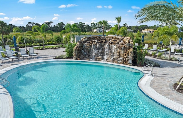 14317 Eagle Branch Dr, Nokomis, FL 34275 - outdoor pool with a patio area