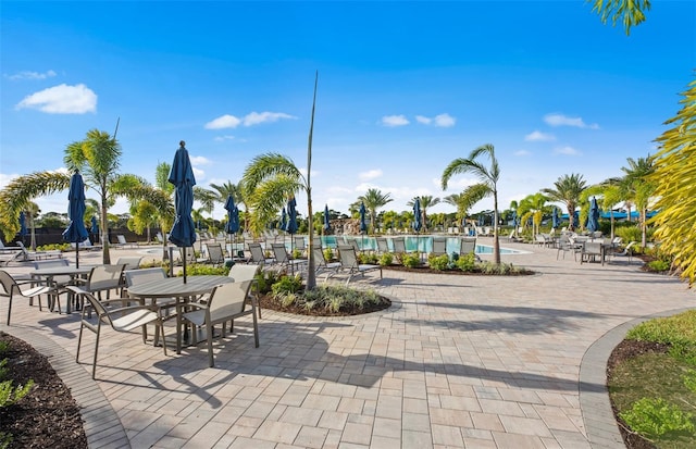 14317 Eagle Branch Dr, Nokomis, FL 34275 - surrounding community featuring a swimming pool and a patio area