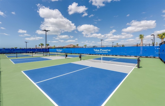 14317 Eagle Branch Dr, Nokomis, FL 34275 - view of tennis court with community basketball court