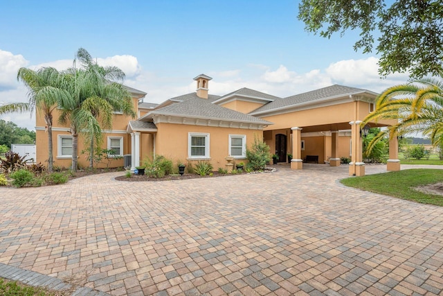 11430 Trotting Down Dr, Odessa, FL 33556 - view of front of house featuring stucco siding