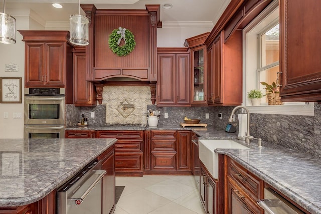 11430 Trotting Down Dr, Odessa, FL 33556 - kitchen featuring dark brown cabinets, ornamental molding, hanging light fixtures, appliances with stainless steel finishes, and backsplash