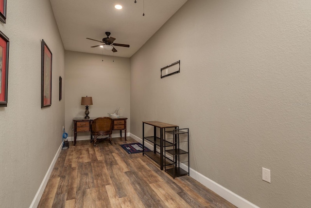 11430 Trotting Down Dr, Odessa, FL 33556 - miscellaneous room with a ceiling fan and dark wood-style flooring