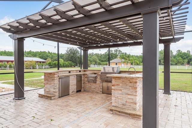 11430 Trotting Down Dr, Odessa, FL 33556 - view of patio / terrace with exterior kitchen and a pergola