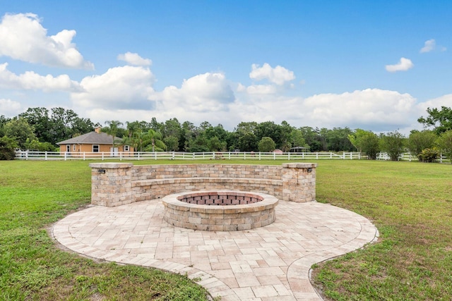 11430 Trotting Down Dr, Odessa, FL 33556 - fenced backyard featuring a fire pit, a patio area, and view of scattered trees