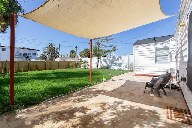 434 77th Ave, St Pete Beach, FL 33706 - fenced backyard featuring a patio