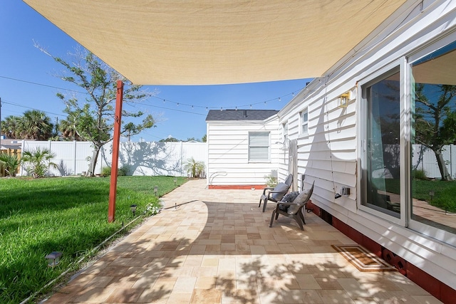 434 77th Ave, St Pete Beach, FL 33706 - fenced backyard featuring a patio