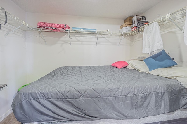 14820 Rue De Bayonne Unit 301, Clearwater, FL 33762 - bedroom featuring carpet floors