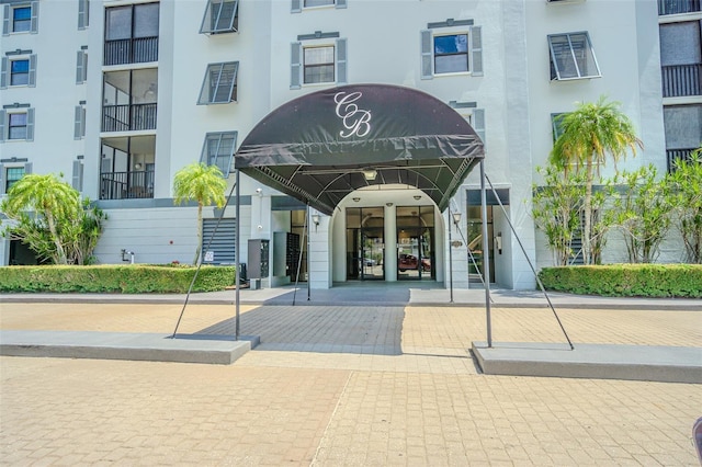 14820 Rue De Bayonne Unit 301, Clearwater, FL 33762 - view of apartment building / complex with stairway