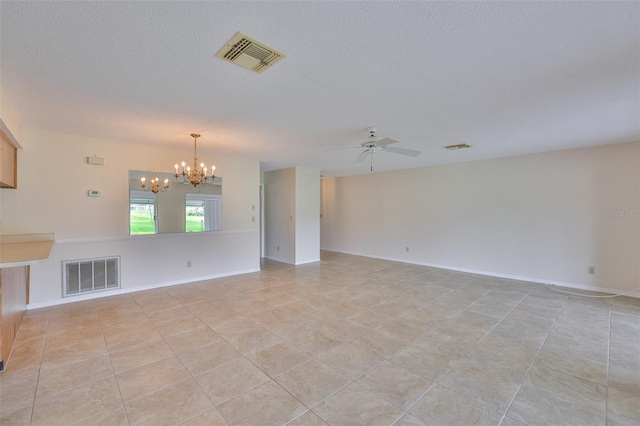 2609 Lancaster Dr, Sun City Center, FL 33573 - unfurnished room featuring a chandelier, a ceiling fan, a textured ceiling, and light tile patterned floors
