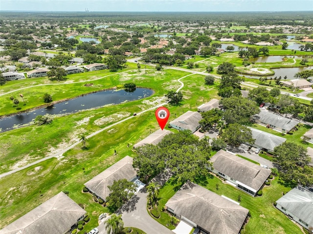2609 Lancaster Dr, Sun City Center, FL 33573 - aerial overview of property's location with a large body of water and nearby suburban area