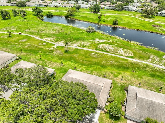 2609 Lancaster Dr, Sun City Center, FL 33573 - aerial view of residential area featuring a nearby body of water