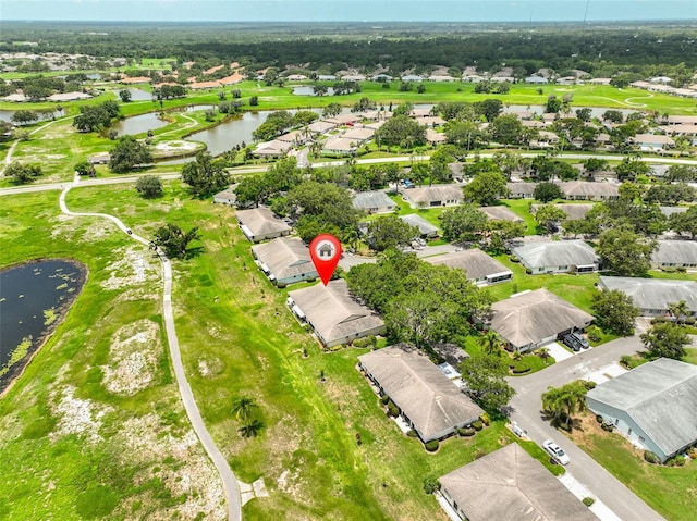 2609 Lancaster Dr, Sun City Center, FL 33573 - aerial view of property's location featuring a nearby body of water and nearby suburban area