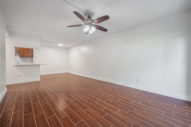 3325 Bayshore Blvd Unit A17, Tampa, FL 33629 - unfurnished living room with a ceiling fan and dark wood-type flooring