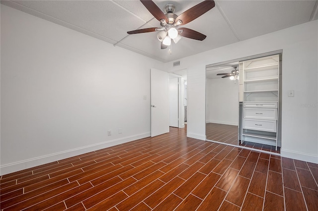 3325 Bayshore Blvd Unit A17, Tampa, FL 33629 - unfurnished bedroom with dark wood-style floors, a closet, and ceiling fan