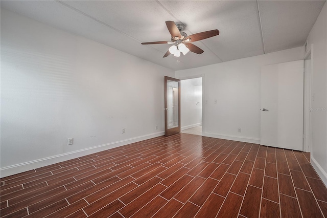3325 Bayshore Blvd Unit A17, Tampa, FL 33629 - empty room featuring a ceiling fan and dark wood-style flooring