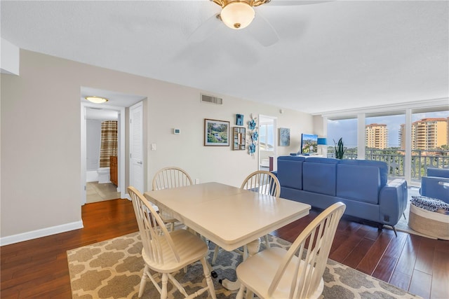 700 Beach Dr NE Unit 602, Saint Petersburg, FL 33701 - dining area featuring hardwood / wood-style floors and a ceiling fan
