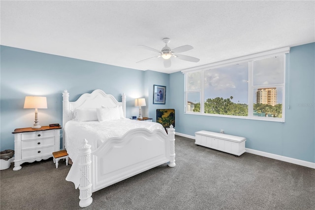 700 Beach Dr NE Unit 602, Saint Petersburg, FL 33701 - carpeted bedroom with baseboards and ceiling fan