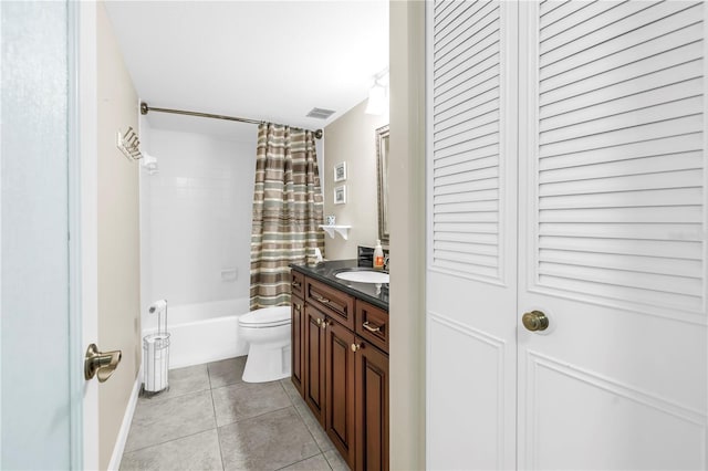 700 Beach Dr NE Unit 602, Saint Petersburg, FL 33701 - full bath featuring tile patterned flooring, vanity, shower / tub combo with curtain, and a closet