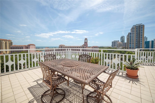 700 Beach Dr NE Unit 602, Saint Petersburg, FL 33701 - view of patio featuring outdoor dining space and a water view