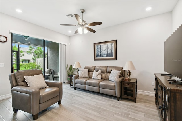 4653 Ancona Way, Wesley Chapel, FL 33543 - living room with ceiling fan, light wood-style floors, and recessed lighting