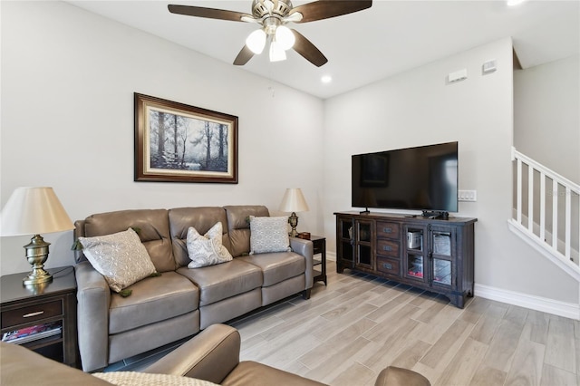 4653 Ancona Way, Wesley Chapel, FL 33543 - living area featuring light wood finished floors, ceiling fan, recessed lighting, and stairs